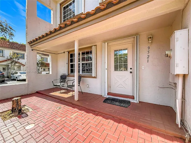 a front view of a house with a outdoor space