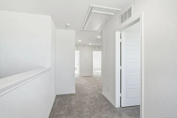 a view of a room with an empty space