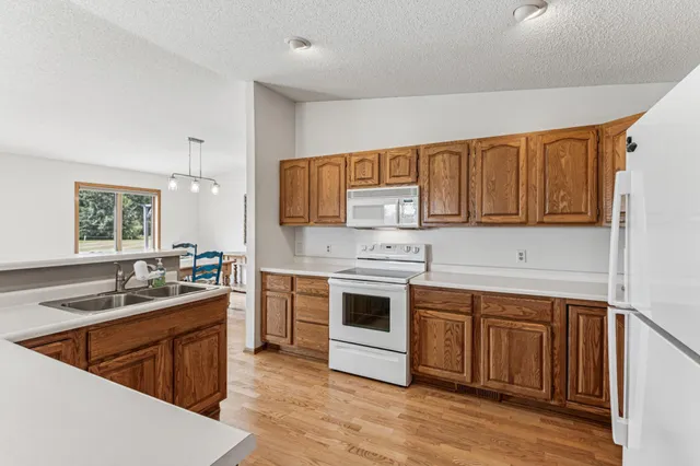 $320,000 | 728 Mulligan Drive, Unit A, Osceola, WI 54020