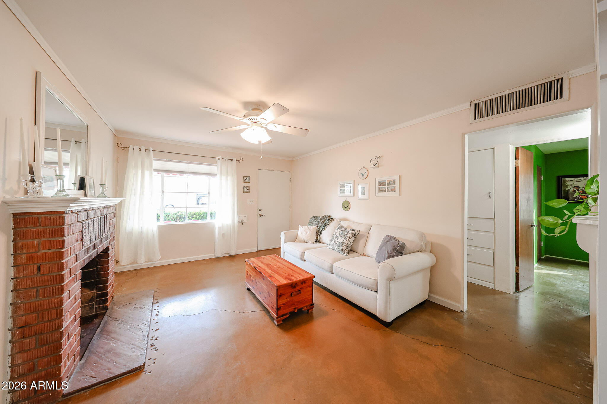 3108 North 21st Place Phoenix, AZ 85016 - Photo 11 of 56 a living room with furniture and a fireplace