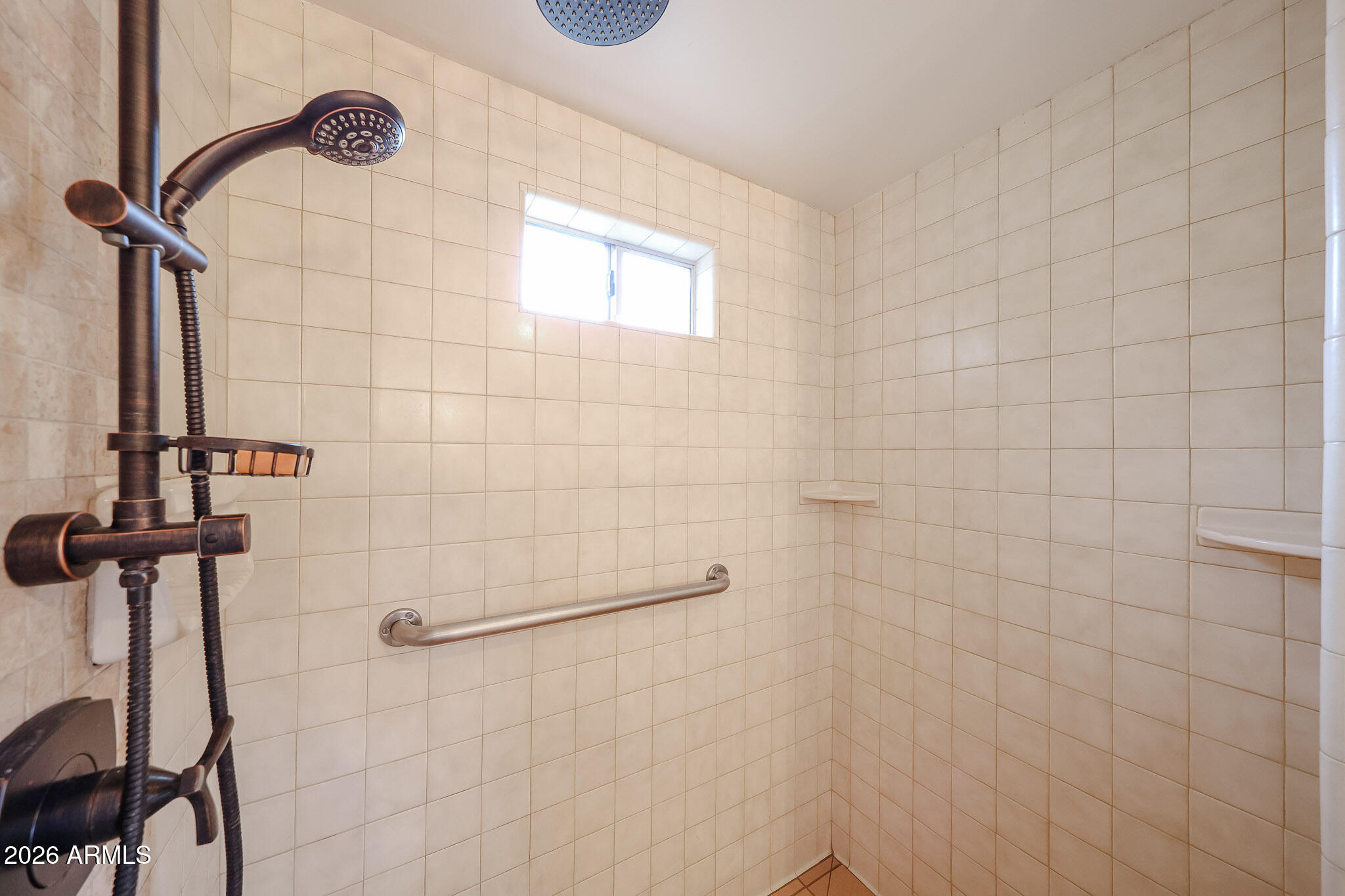 3108 North 21st Place Phoenix, AZ 85016 - Photo 25 of 56 a bathroom with a shower