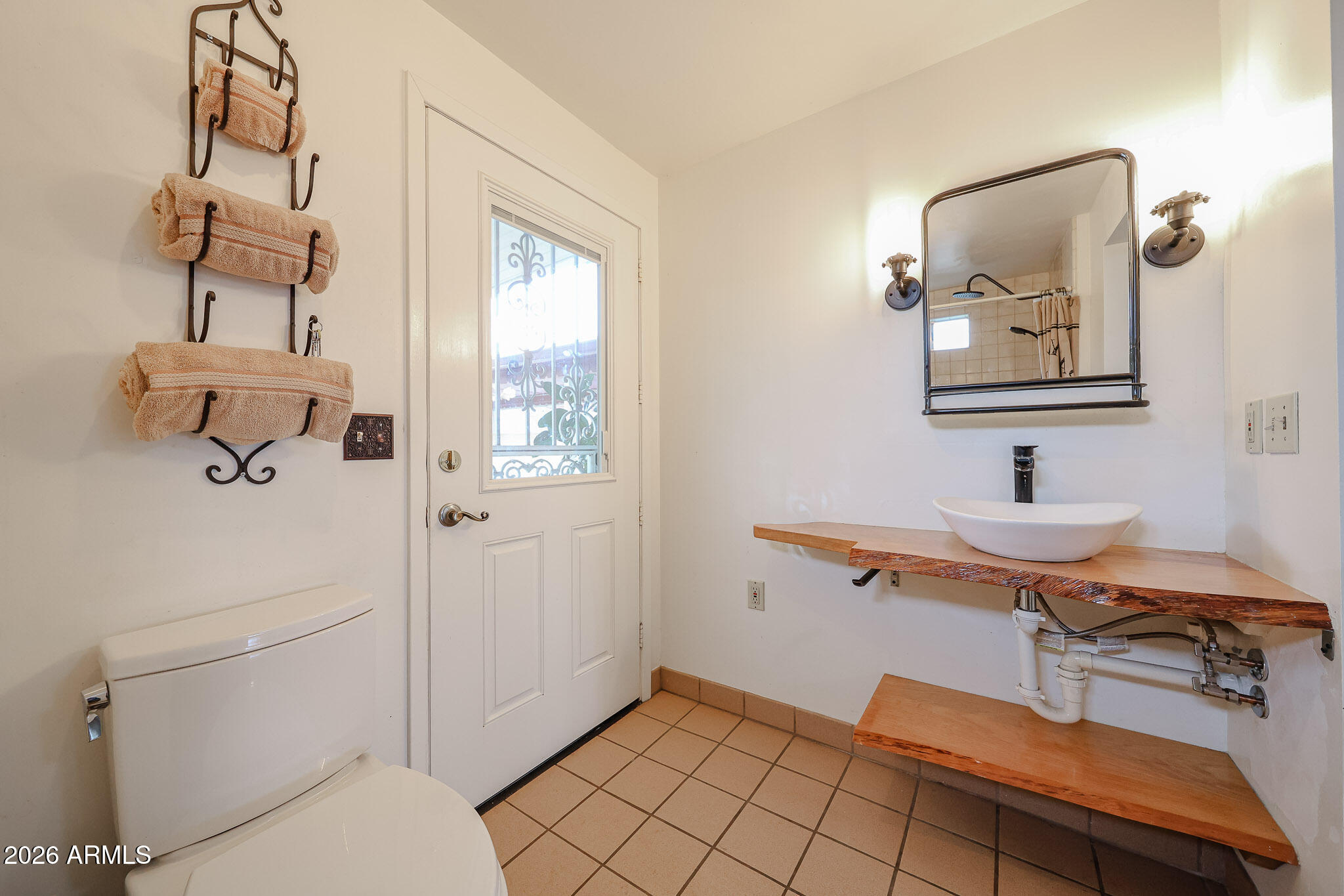 3108 North 21st Place Phoenix, AZ 85016 - Photo 26 of 56 a view of a workspace with furniture and windows