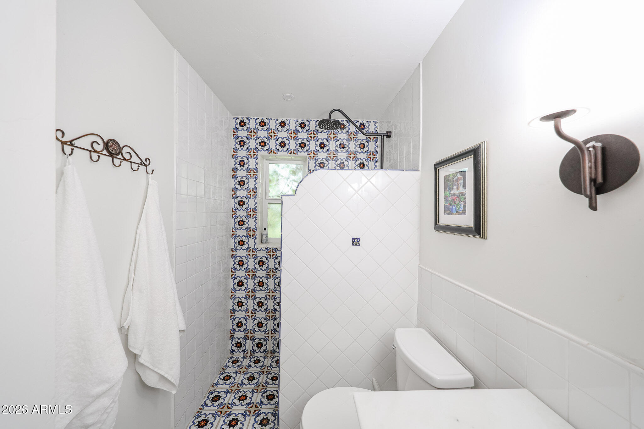 3108 North 21st Place Phoenix, AZ 85016 - Photo 31 of 56 a bathroom with a bathtub and shower