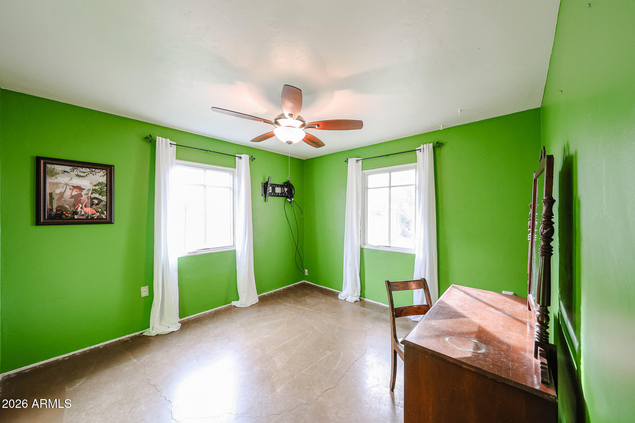 3108 North 21st Place Phoenix, AZ 85016 - Photo 33 of 56 a bed room with a bed and a window