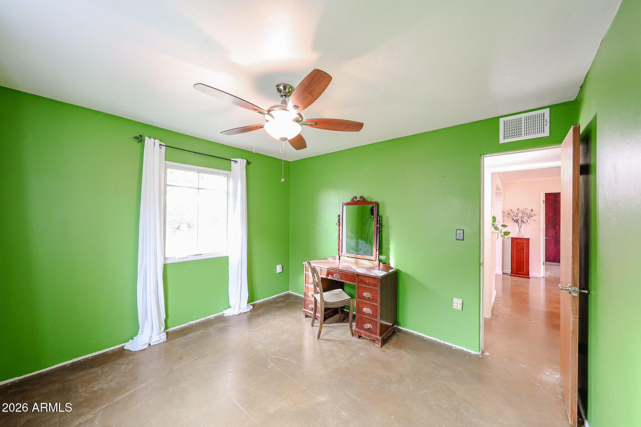 3108 North 21st Place Phoenix, AZ 85016 - Photo 34 of 56 a dining room with furniture and a window
