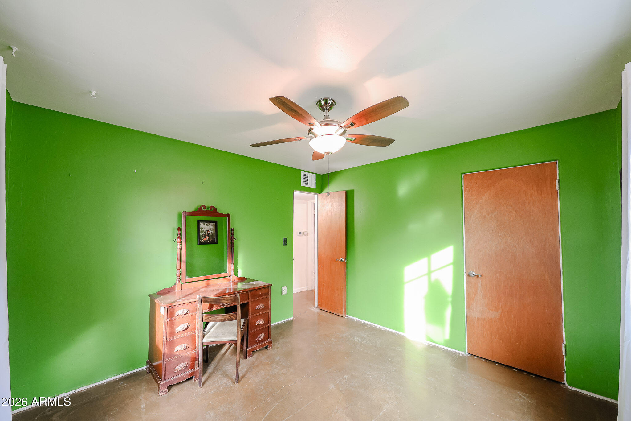 3108 North 21st Place Phoenix, AZ 85016 - Photo 35 of 56 a work room with furniture and a ceiling fan