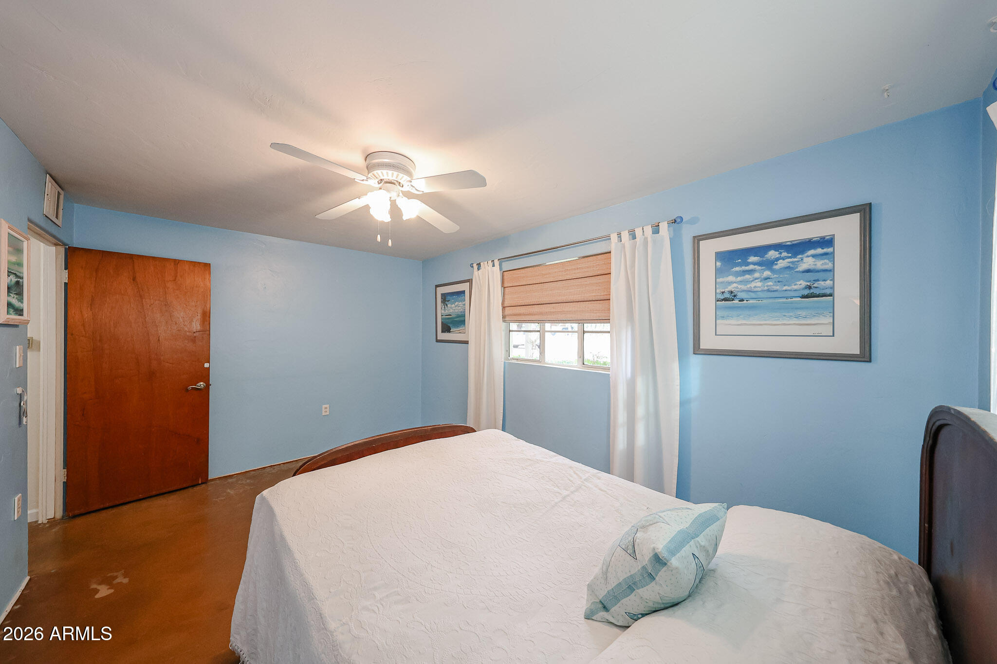 3108 North 21st Place Phoenix, AZ 85016 - Photo 38 of 56 a bedroom with a bed and a window
