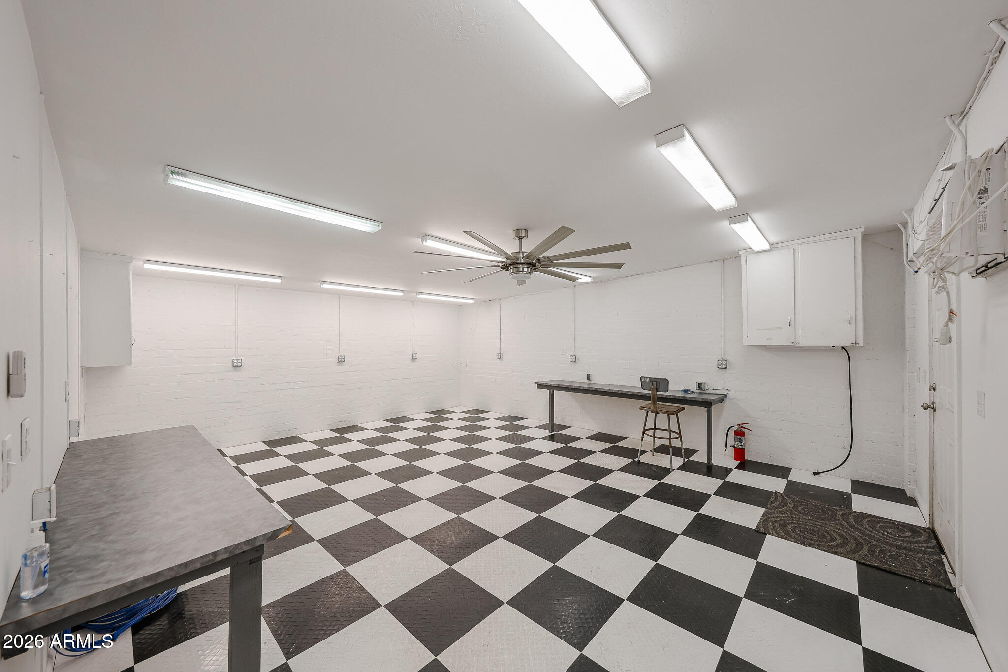 3108 North 21st Place Phoenix, AZ 85016 - Photo 50 of 56 a black and white checkered floor with a black white checkered floor