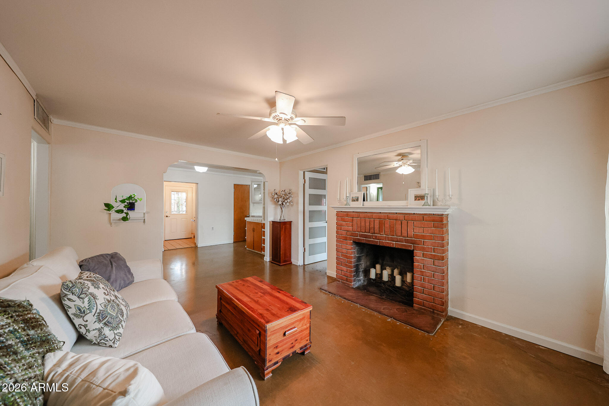 3108 North 21st Place Phoenix, AZ 85016 - Photo 8 of 56 a living room with furniture and a fireplace