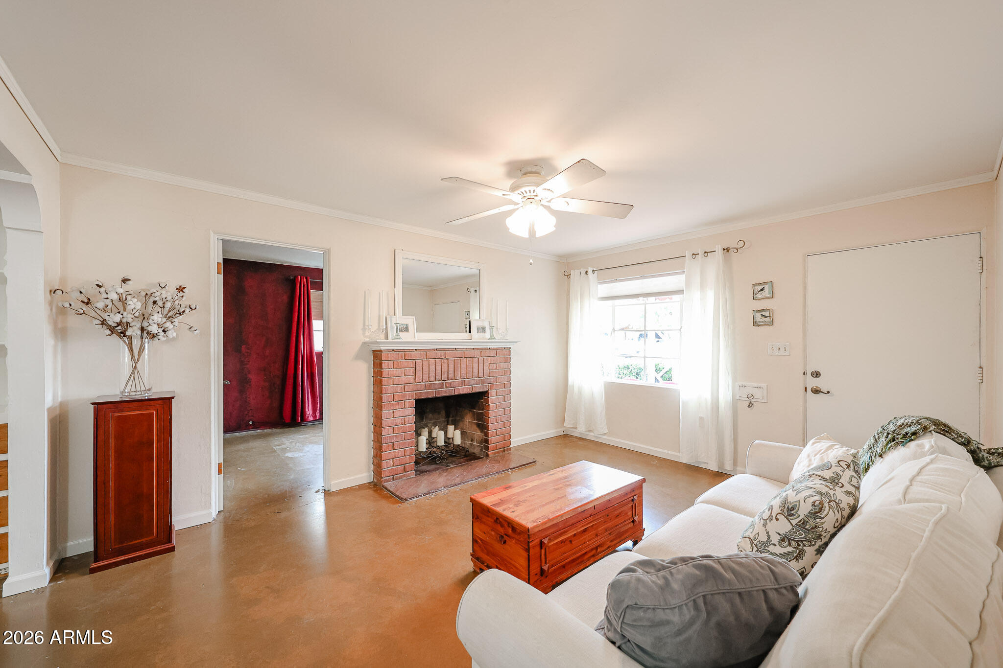 3108 North 21st Place Phoenix, AZ 85016 - Photo 10 of 56 a living room with furniture and a fireplace