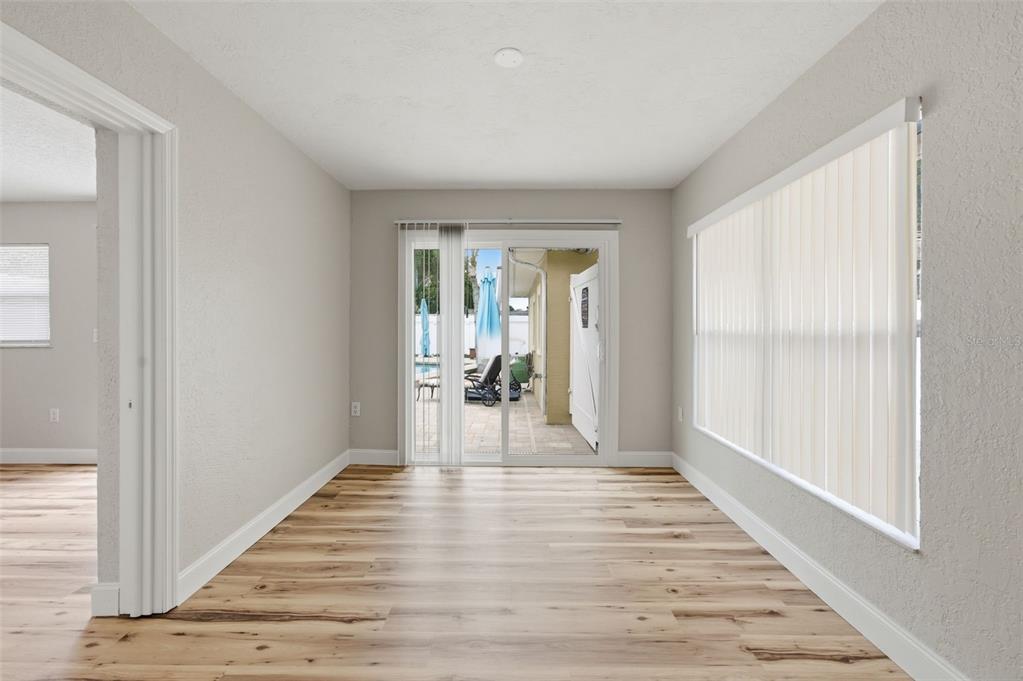 5340 Dartmouth Road New Port Richey, FL 34652 - Photo 19 of 41 a view of a room with wooden floor