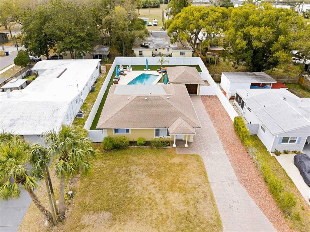 5340 Dartmouth Road New Port Richey, FL 34652 - Photo 2 of 41 a view of yard with swimming pool