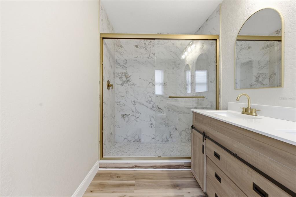 5340 Dartmouth Road New Port Richey, FL 34652 - Photo 23 of 41 a bathroom with a sink and a mirror