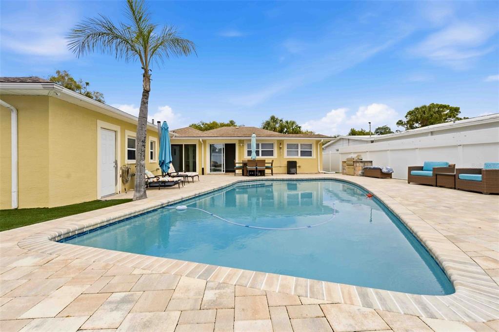 5340 Dartmouth Road New Port Richey, FL 34652 - Photo 30 of 41 a view of a swimming pool with a patio
