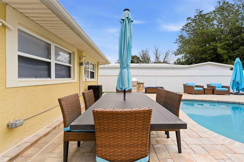 5340 Dartmouth Road New Port Richey, FL 34652 - Photo 34 of 41 a terrace of a house with outdoor seating