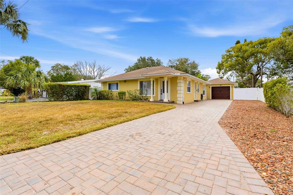5340 Dartmouth Road New Port Richey, FL 34652 - Photo 39 of 41 a front view of a house with a yard