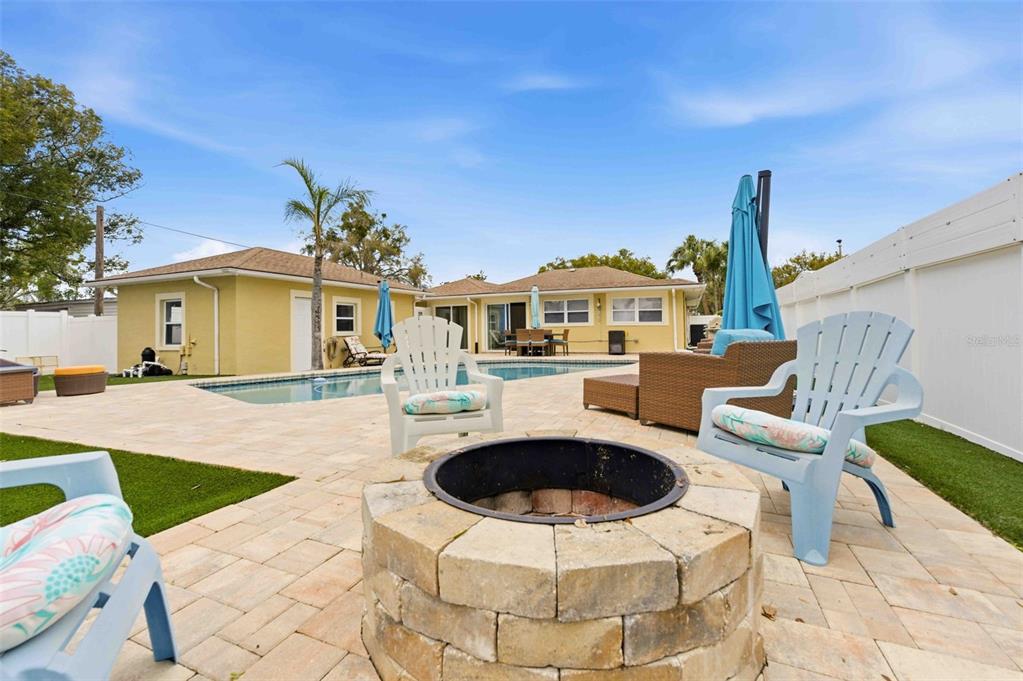 5340 Dartmouth Road New Port Richey, FL 34652 - Photo 4 of 41 a view of a house with swimming pool and furniture