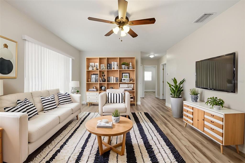 5340 Dartmouth Road New Port Richey, FL 34652 - Photo 6 of 41 a living room with furniture and wooden floor