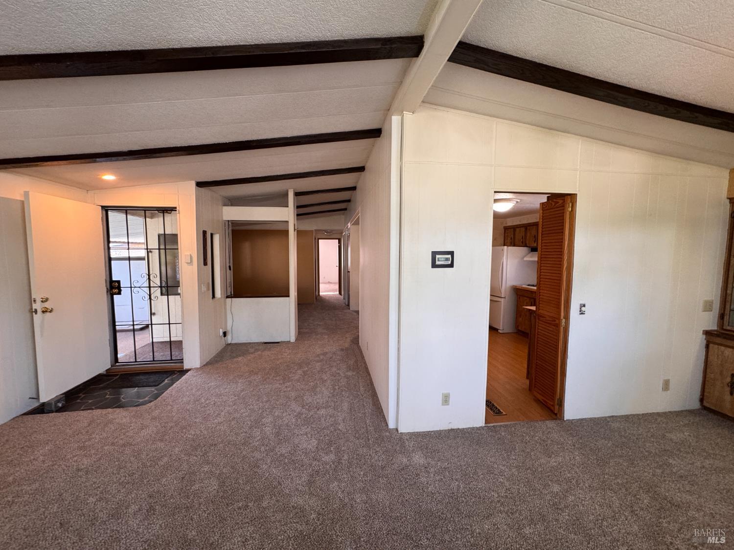 97 Glenoak Court Santa Rosa, CA 95409 - Photo 10 of 35 Living room view showing entry, hall way and kitchen entry