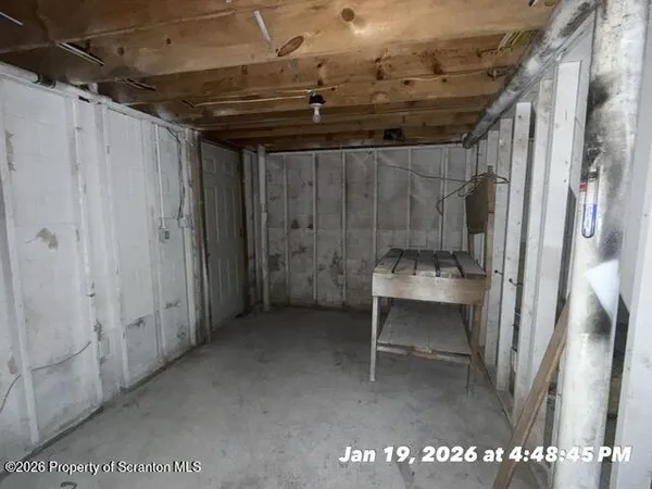 a bathroom with a toilet and a sink