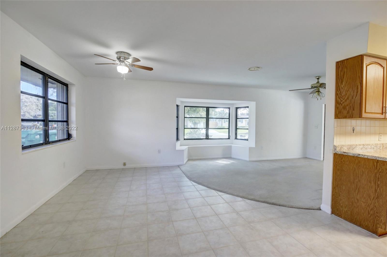 8751 Ridgeland Drive Cutler Bay, FL 33157 - Photo 11 of 26 a view of an empty room with a window