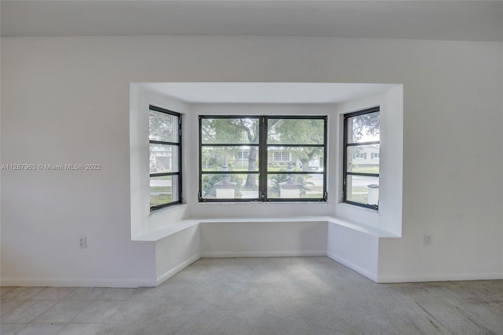 8751 Ridgeland Drive Cutler Bay, FL 33157 - Photo 12 of 26 an empty room with a window