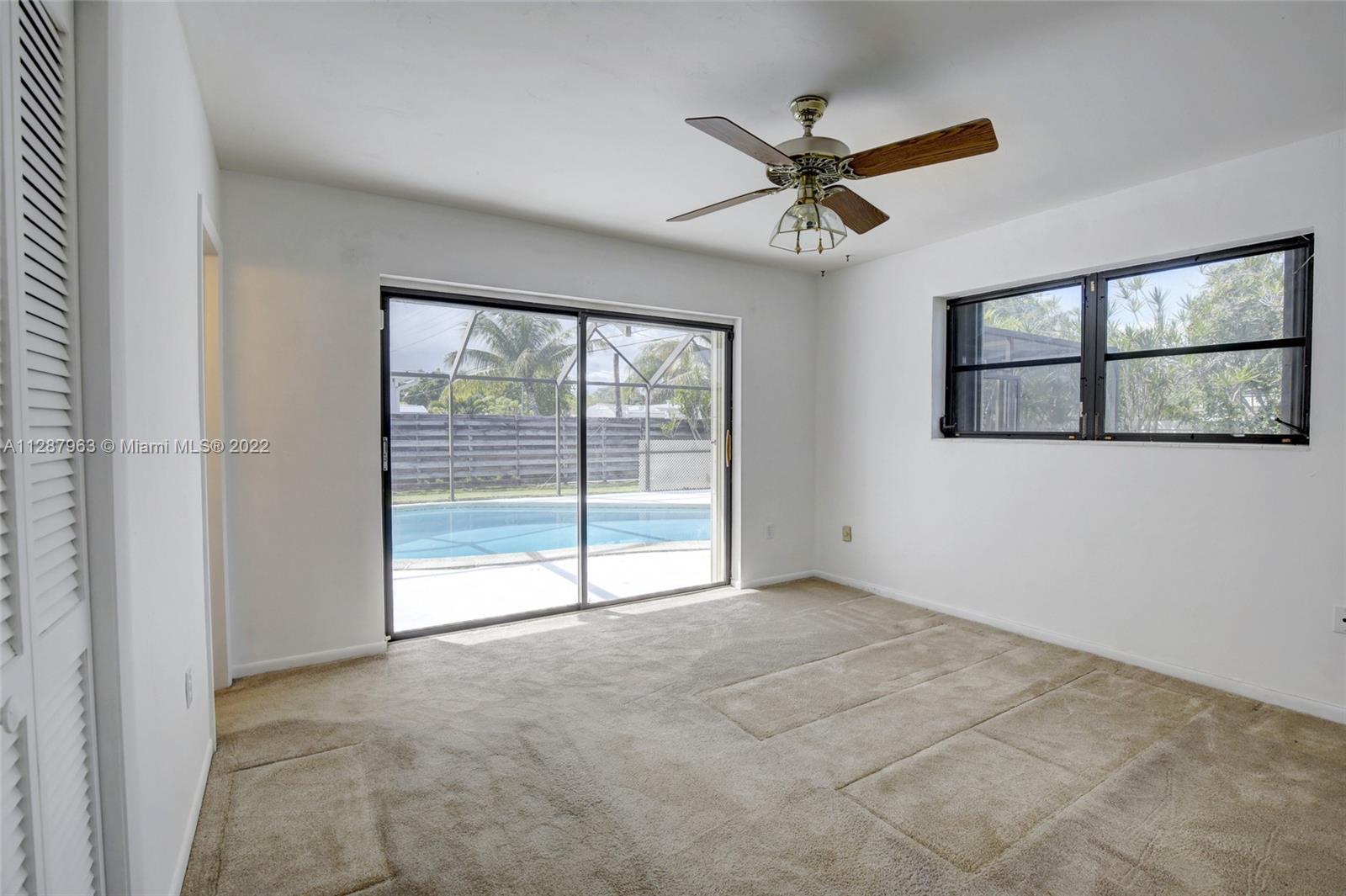 8751 Ridgeland Drive Cutler Bay, FL 33157 - Photo 15 of 26 a view of an empty room with a window