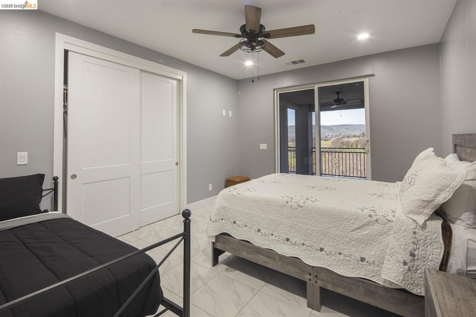 4626 Little John Road Copperopolis, CA 95228 - Photo 42 of 53 a bedroom with a bed and a dresser