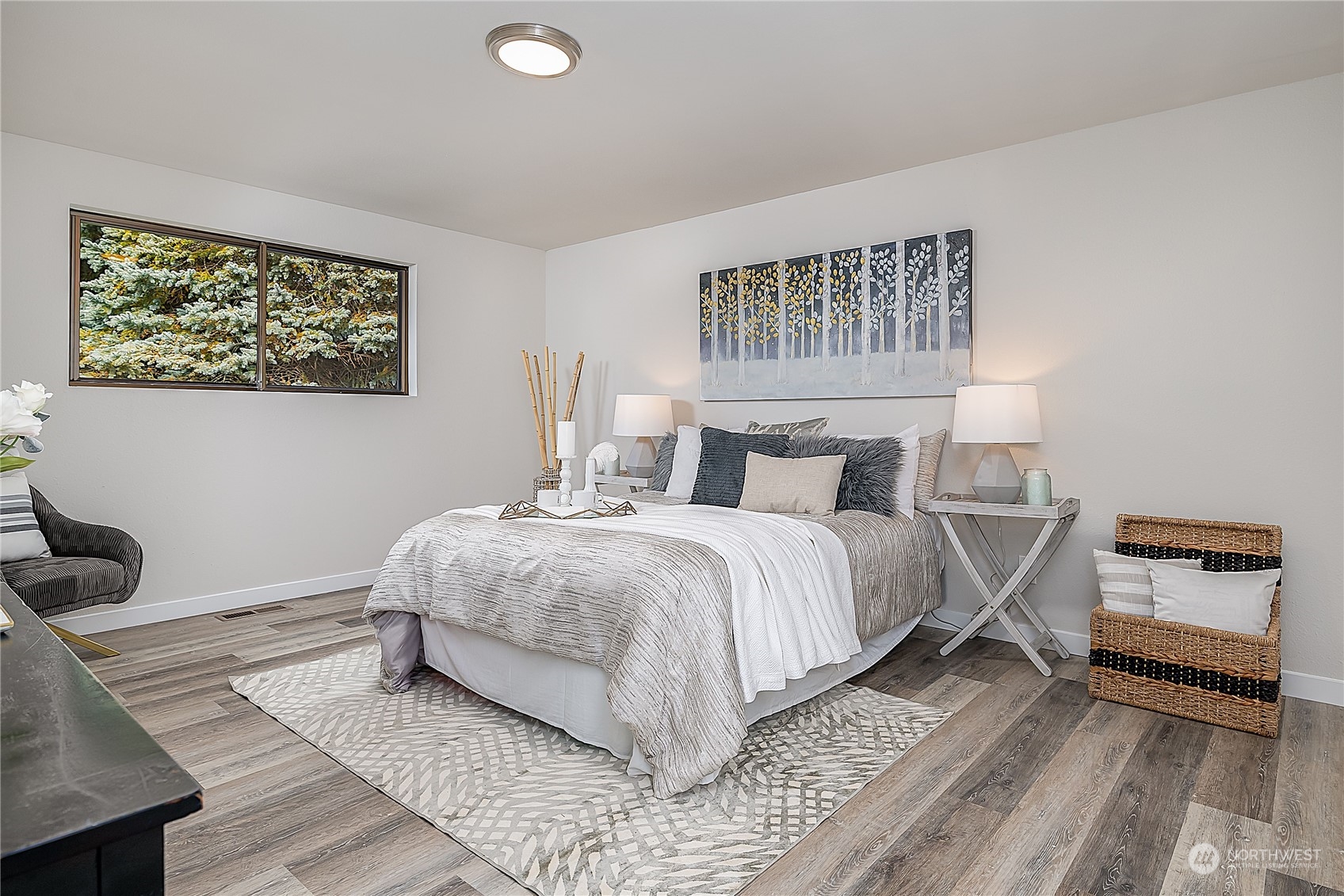 3024 Northeast 7th Street Renton, WA 98056 - Photo 13 of 23 a bedroom with a bed and a couch