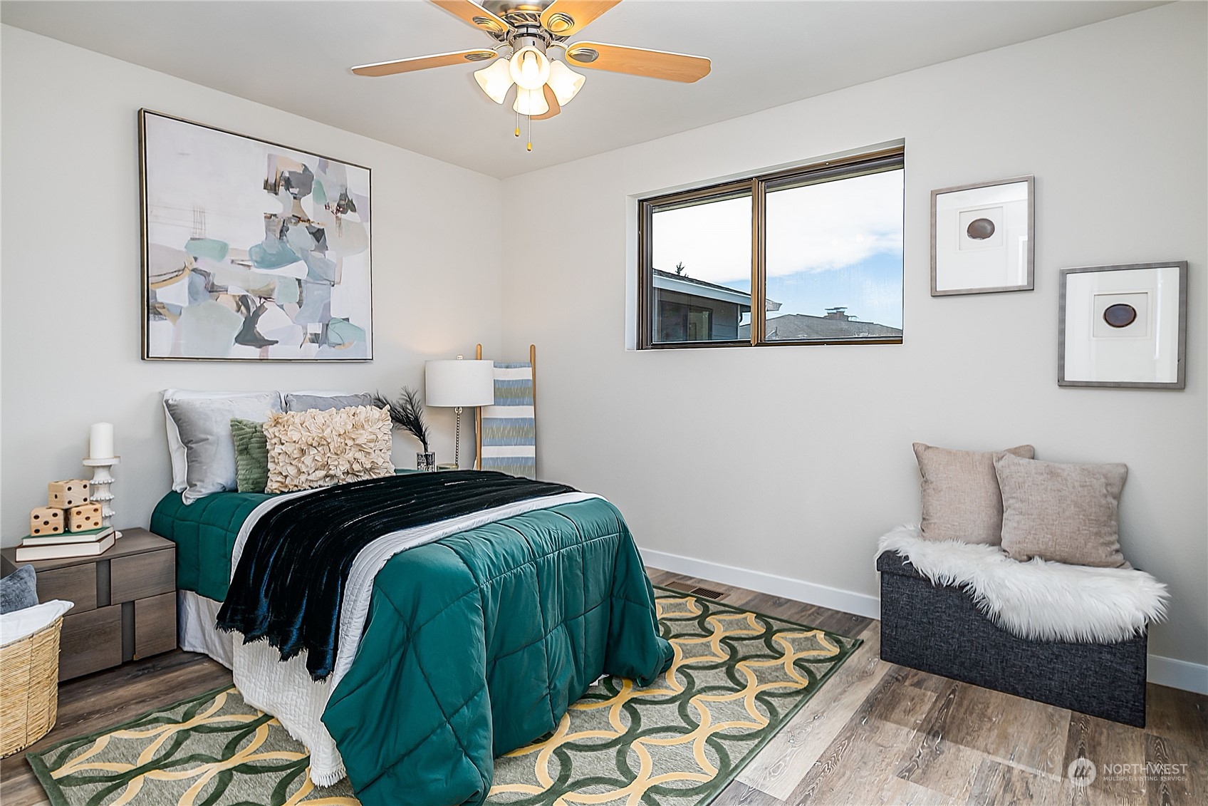 3024 Northeast 7th Street Renton, WA 98056 - Photo 17 of 23 a bedroom with bed and a couch