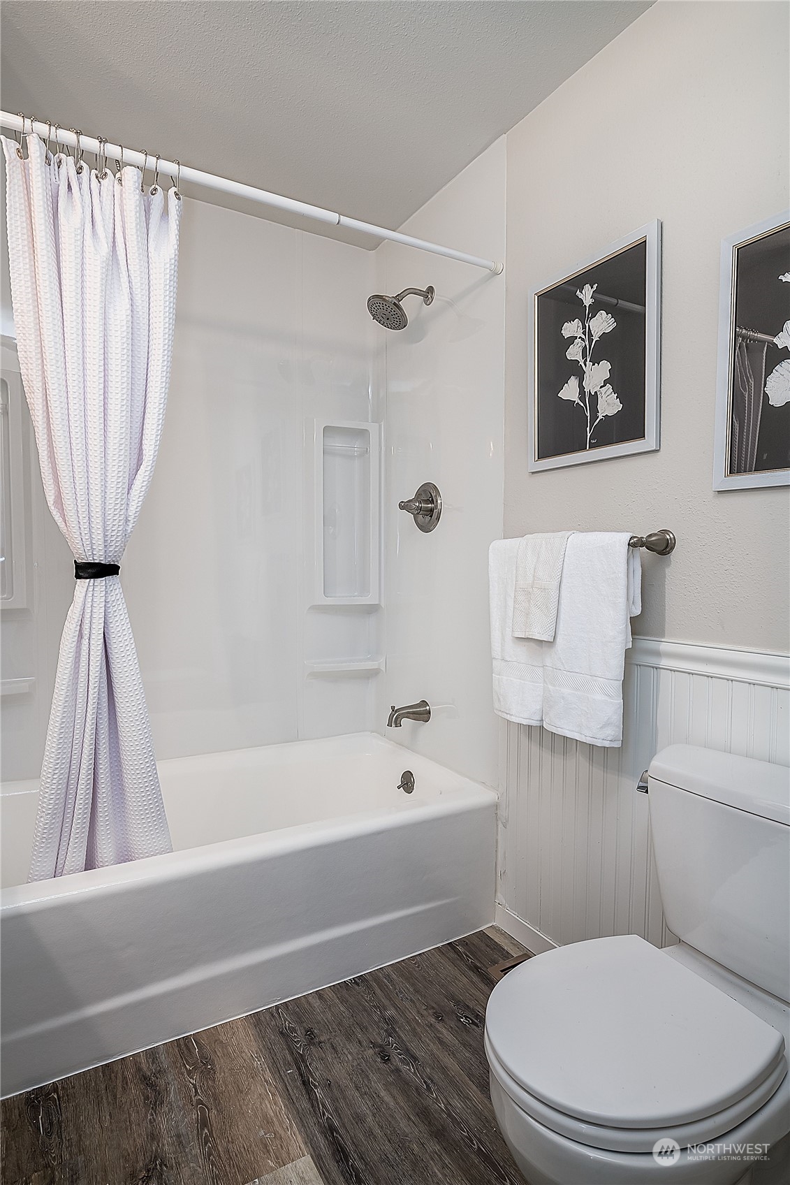 3024 Northeast 7th Street Renton, WA 98056 - Photo 18 of 23 a bathroom with a toilet and a bathtub