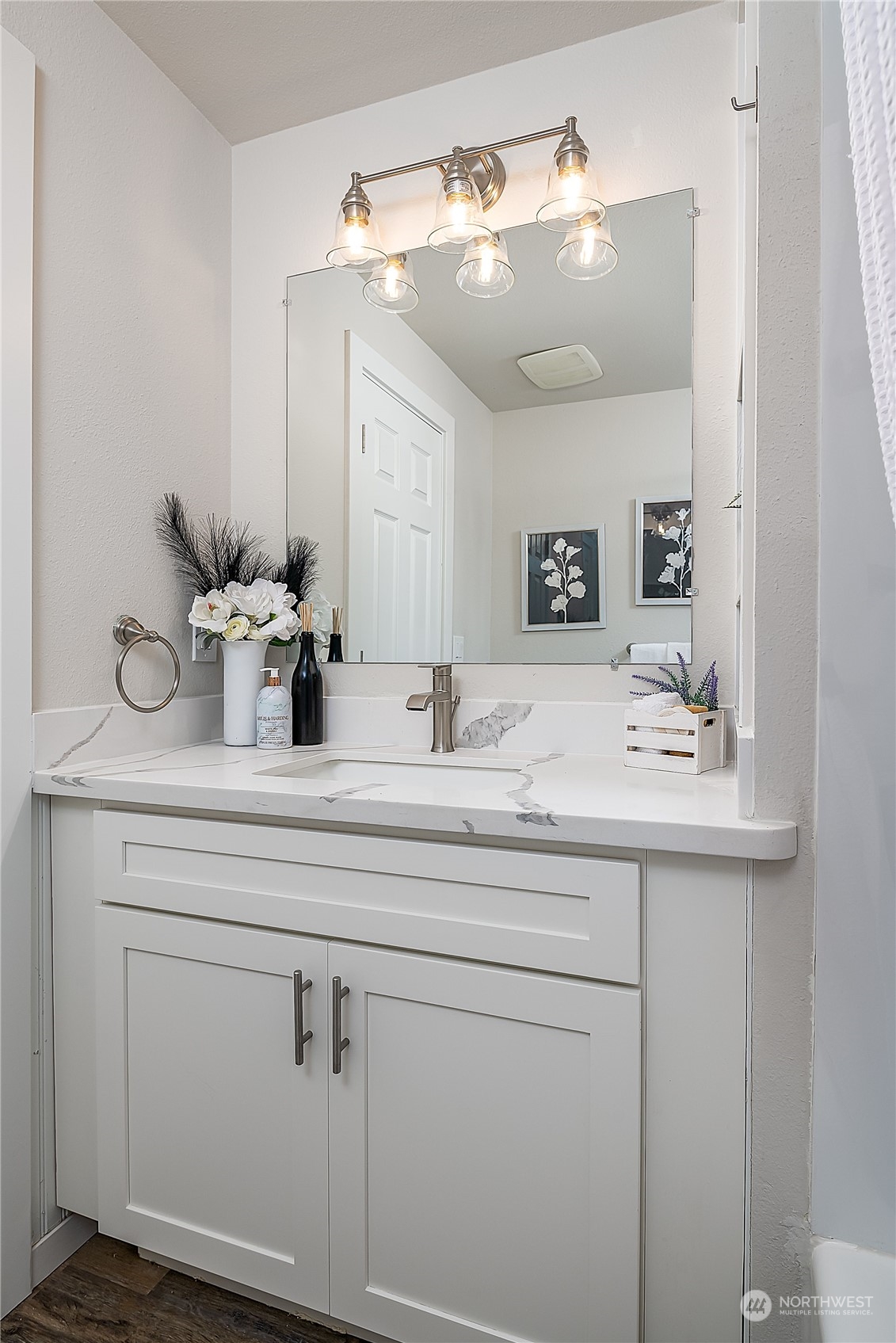 3024 Northeast 7th Street Renton, WA 98056 - Photo 19 of 23 a bathroom with a sink and a mirror