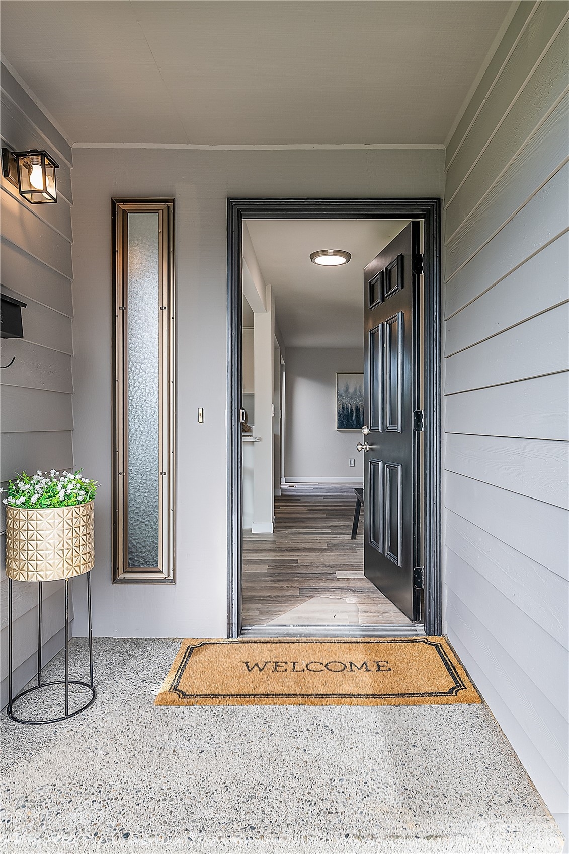 3024 Northeast 7th Street Renton, WA 98056 - Photo 3 of 23 a view of front door with chair and dining table