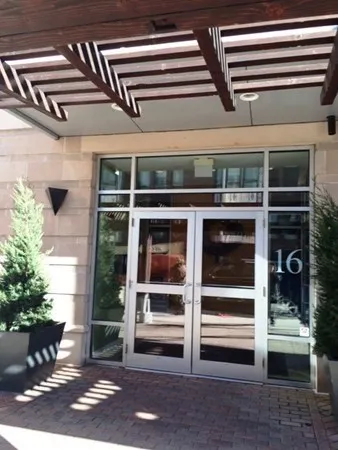 a view of an entryway with a door