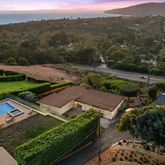 an aerial view of residential house with outdoor space