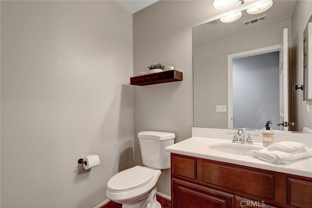 13387 Babbling Brook Way Eastvale, CA 92880 - Photo 22 of 75 Downstairs half bathroom