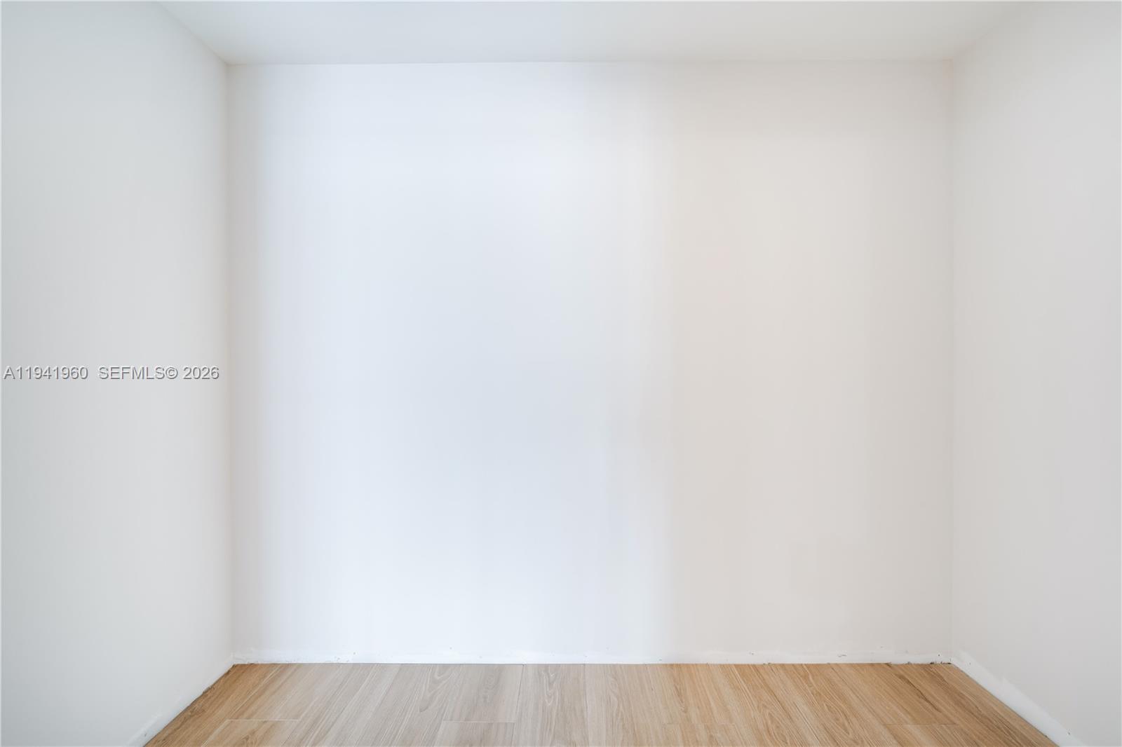 700 Northeast 24th Street, Unit 4203 Miami, FL 33137 - Photo 23 of 51 a view of a room with wooden floor
