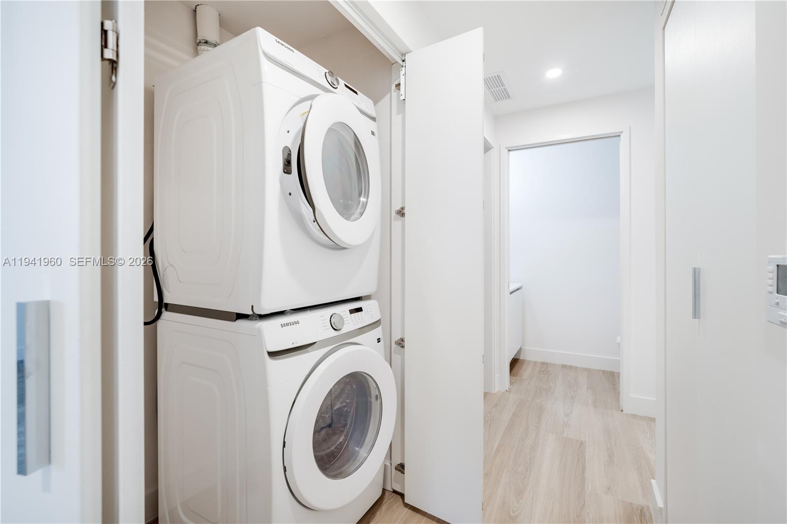 700 Northeast 24th Street, Unit 4203 Miami, FL 33137 - Photo 30 of 51 a utility room with dryer and washer