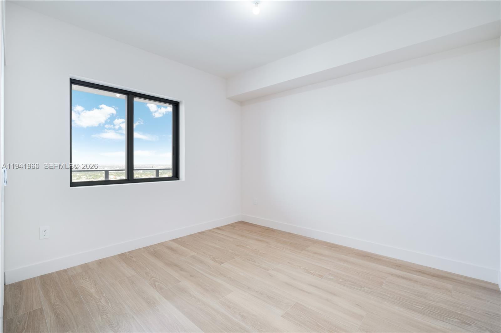 700 Northeast 24th Street, Unit 4203 Miami, FL 33137 - Photo 34 of 51 an empty room with a window