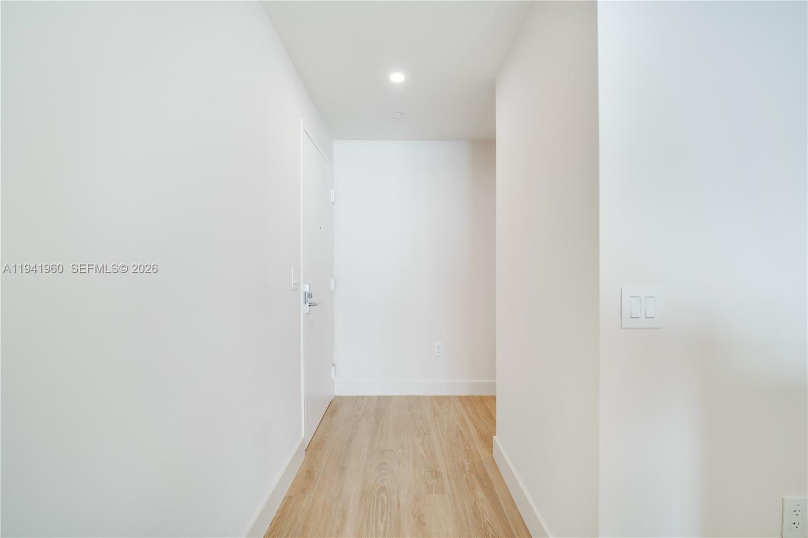 700 Northeast 24th Street, Unit 4203 Miami, FL 33137 - Photo 4 of 51 a view of a room with wooden floor