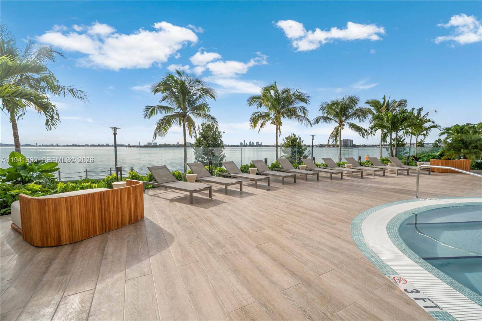 700 Northeast 24th Street, Unit 4203 Miami, FL 33137 - Photo 44 of 51 a view of swimming pool with outdoor seating