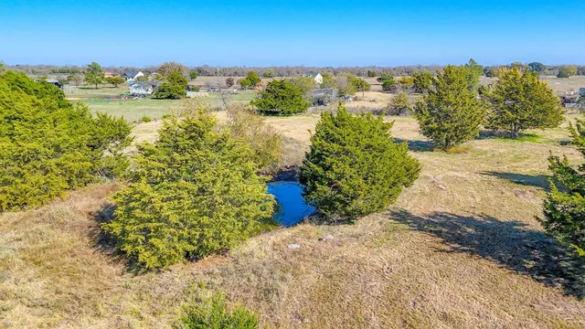 a view of a lake with outdoor space