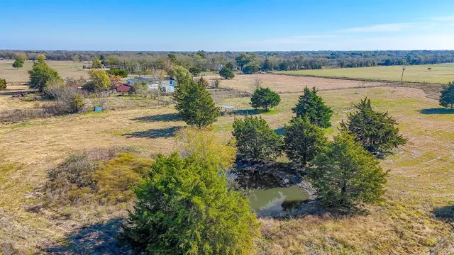 a view of swimming pool with a yard