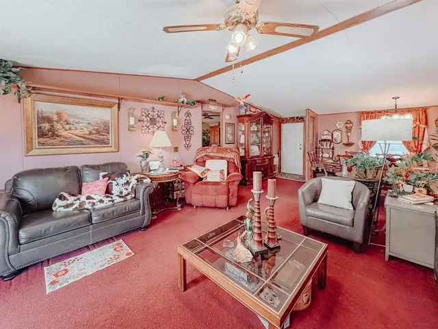 a living room with furniture and a couch