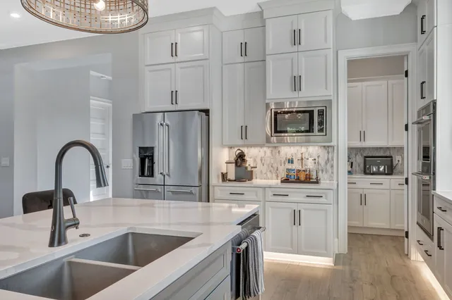a living room with furniture fireplace and flat screen tv