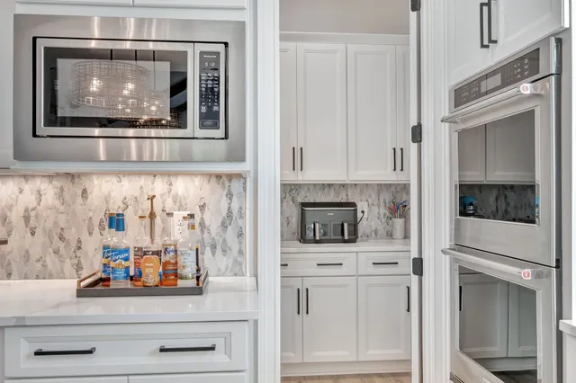 a living room with furniture fireplace and a flat screen tv
