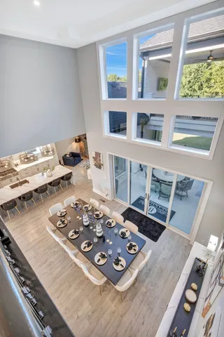 a dining room with furniture and window