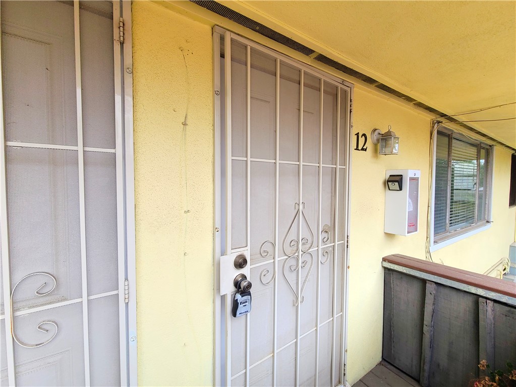 12 West Cypress Avenue Redlands, CA 92373 - Photo 3 of 10 a bathroom with a shower and a sink