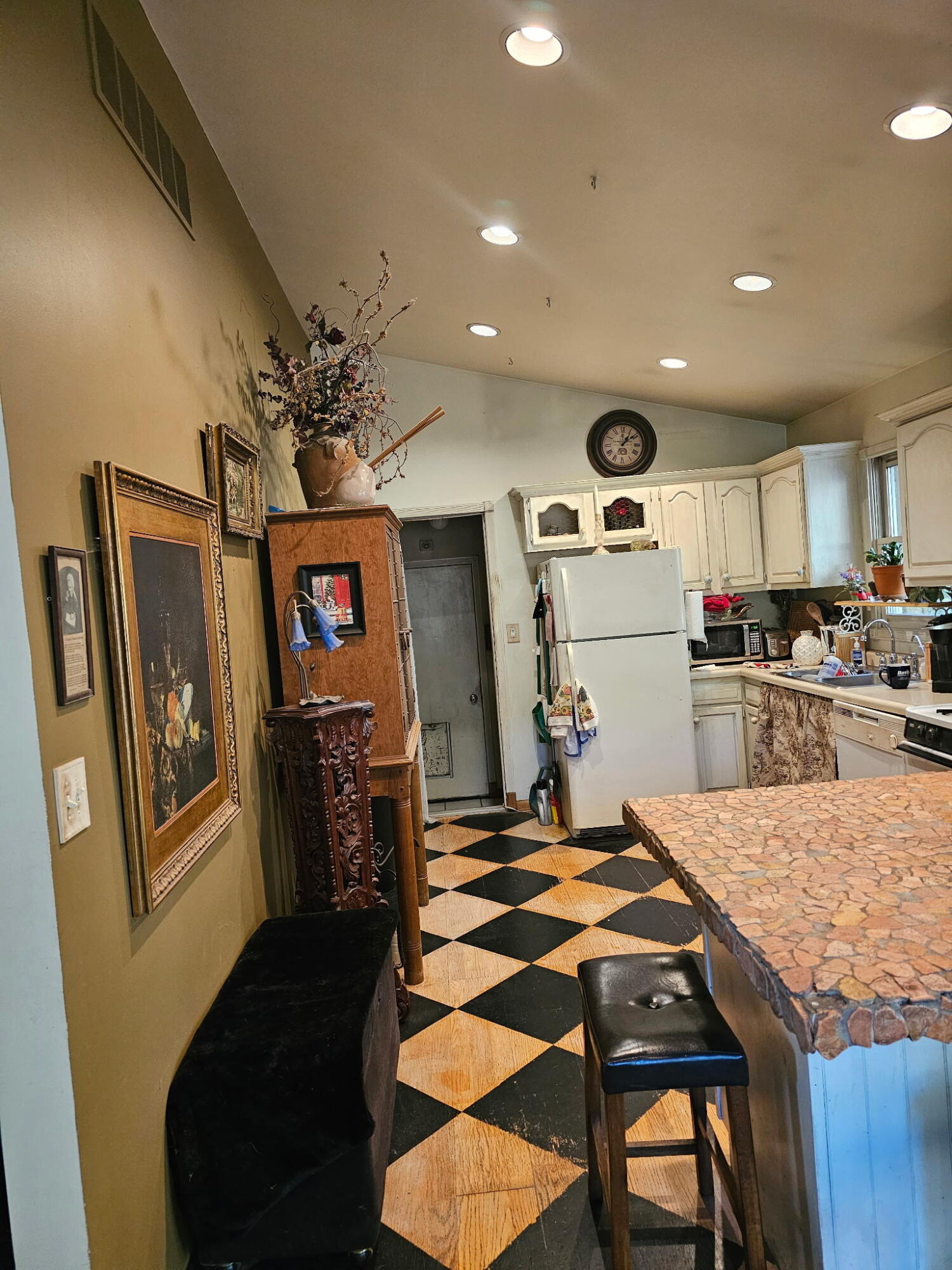 218 Chickadee Trail Michigan City, IN 46360 - Photo 12 of 40 a kitchen with stainless steel appliances kitchen island granite countertop a refrigerator and microwave