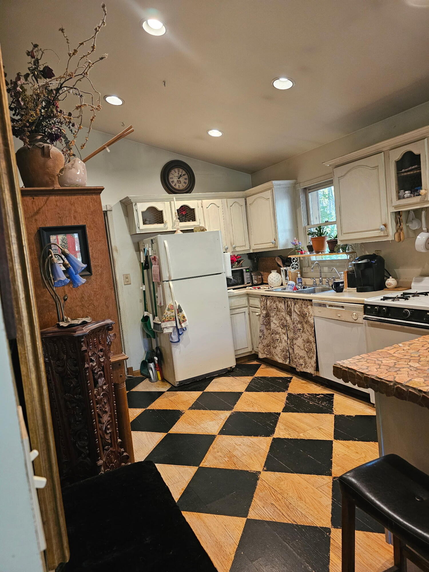 218 Chickadee Trail Michigan City, IN 46360 - Photo 14 of 40 a kitchen with stainless steel appliances granite countertop a sink a stove and cabinets